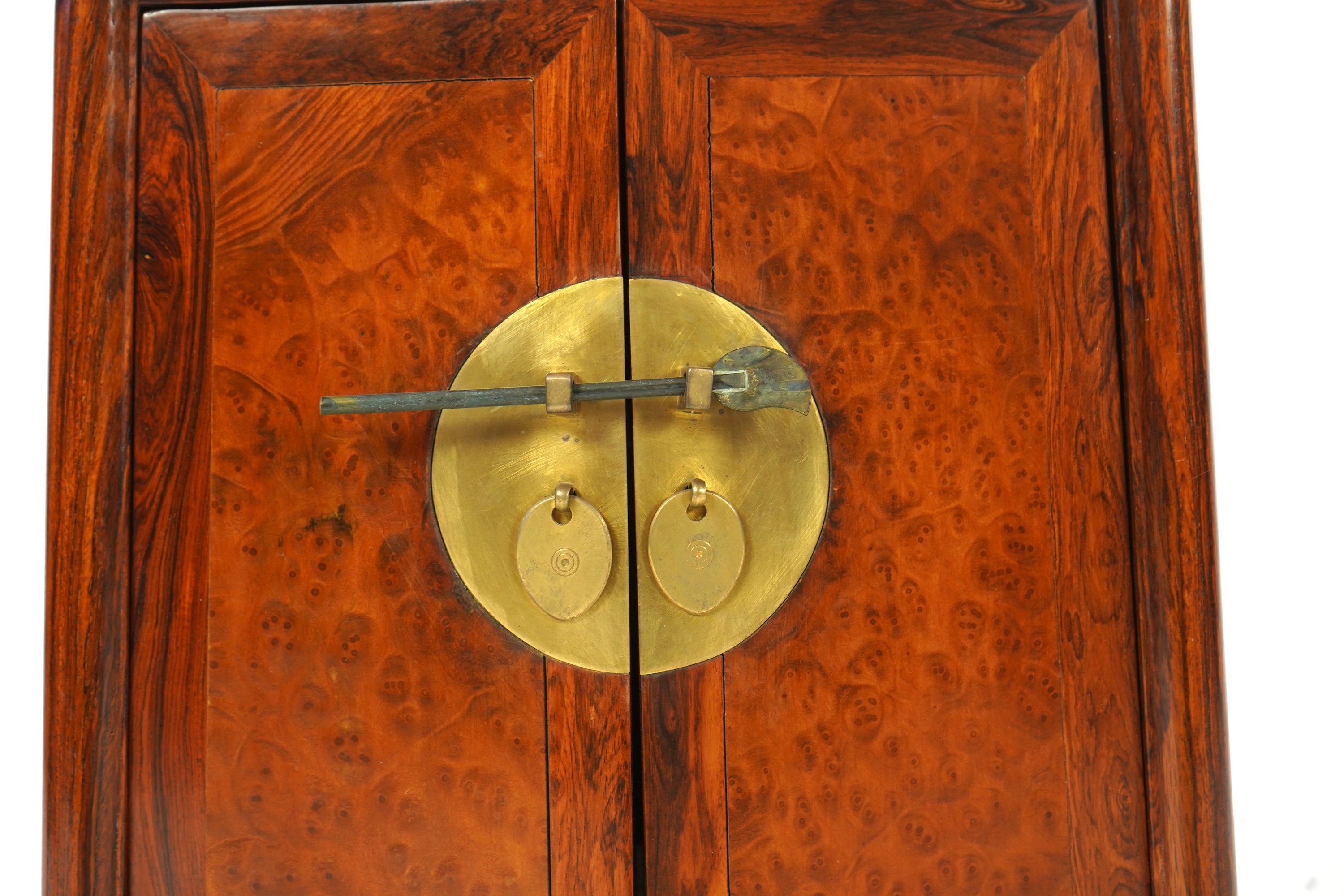 A Chinese huanghuali and burrwood panelled round-corner kang cabinet, 20th century
